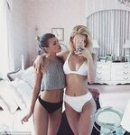 Sofia Richie shows off toned legs in diaphanous white trouse